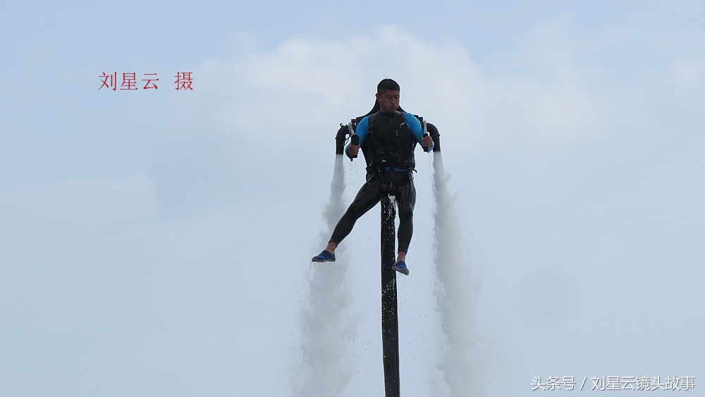 空中滑翔伞三亚,三亚大东海水上飞人