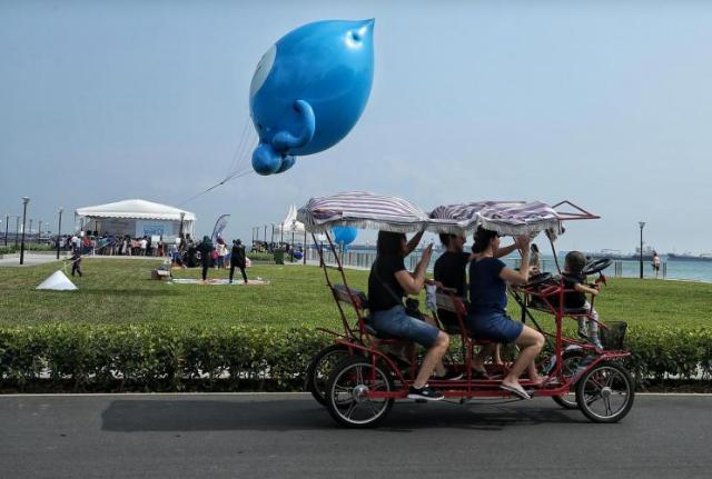 在海中央看海,站在海边看海的感受