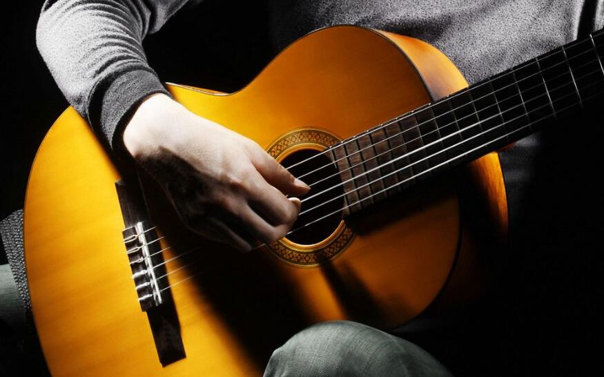 弹吉他手疼吗,弹吉他右胳膊疼怎么办