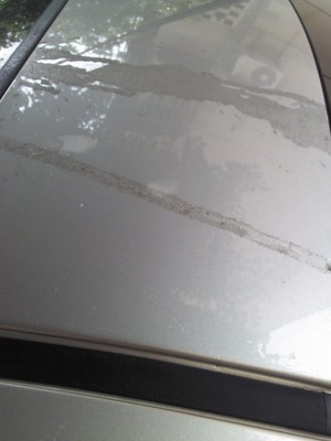 车漆上的502胶水抛光能去除吗,502弄到车漆上怎么处理掉