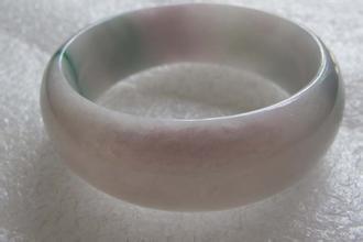 翡翠抛光粉作假怎么处理,抛光粉上色翡翠怎样鉴别