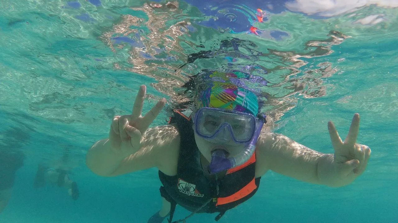 上午在广州捂白过严冬,下午在塞班岛放肆晒黑