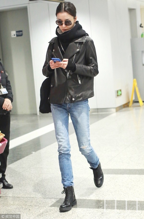 冬天加厚黑色牛仔裤,女生冬天穿黑色牛仔裤配过膝靴