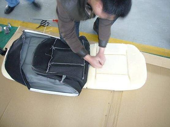 原厂真皮座椅是真皮吗,原厂皮座椅里面是海绵还是布套