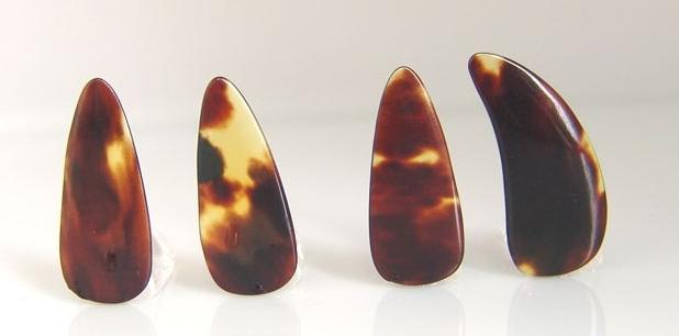 古筝玳瑁甲上的胶怎么除去,古筝玳瑁义甲是真的玳瑁么