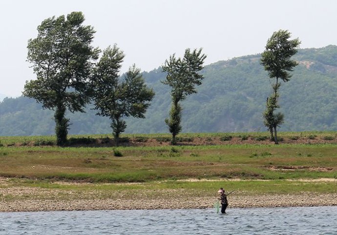 中朝边境美丽的风景,中朝边境桃花盛开的地方