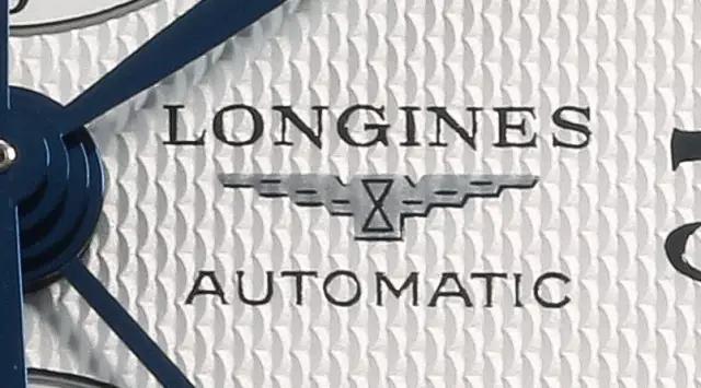 浪琴月相gs真假对比,浪琴手表质保卡真假图片对比