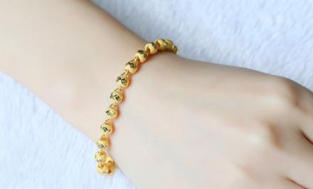 金首饰戴到手上变黑,金首饰戴了没有那么亮了