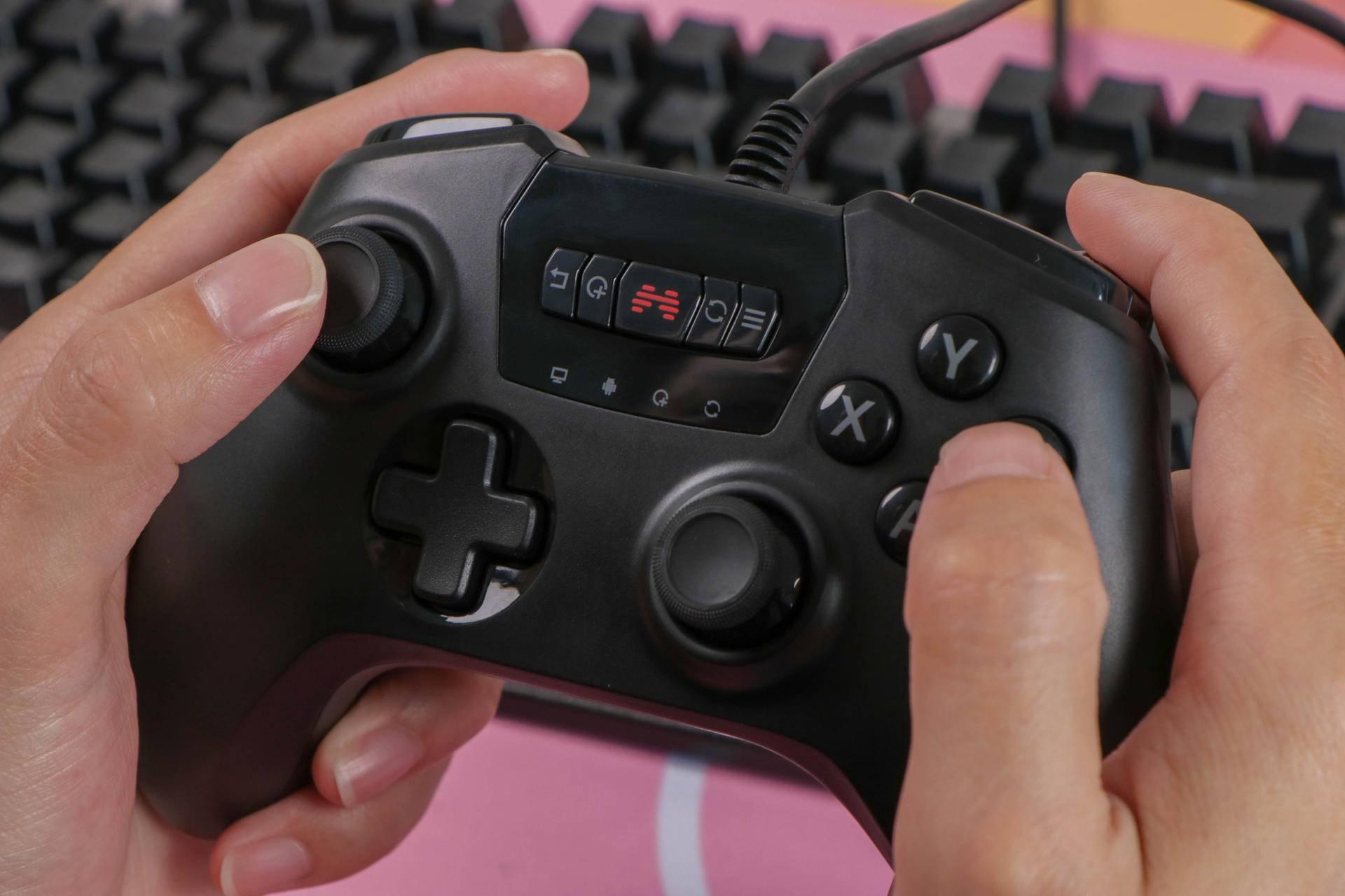 高性价比游戏手柄推荐2k,性价比高的游戏手柄雷神