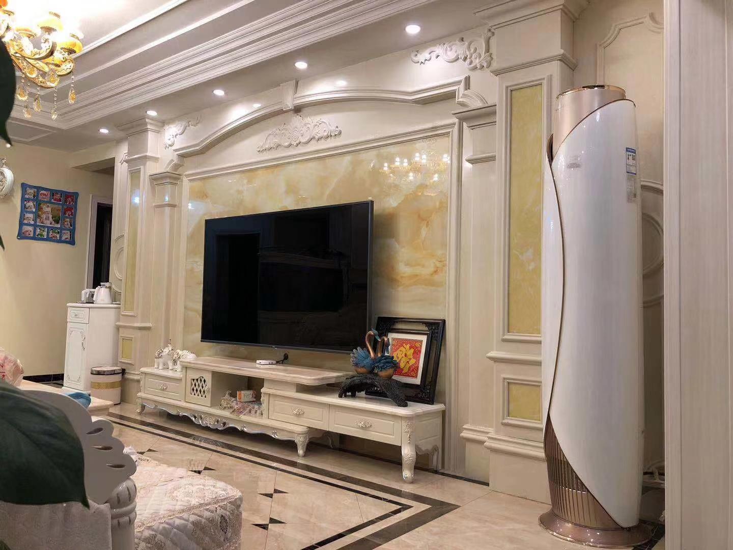 电视背景墙是贴石材还是瓷砖呢,现在最流行的瓷砖电视背景墙