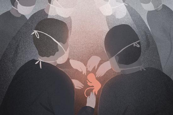 这位医生能给没出生的胎儿做手术甚至能修复脊柱