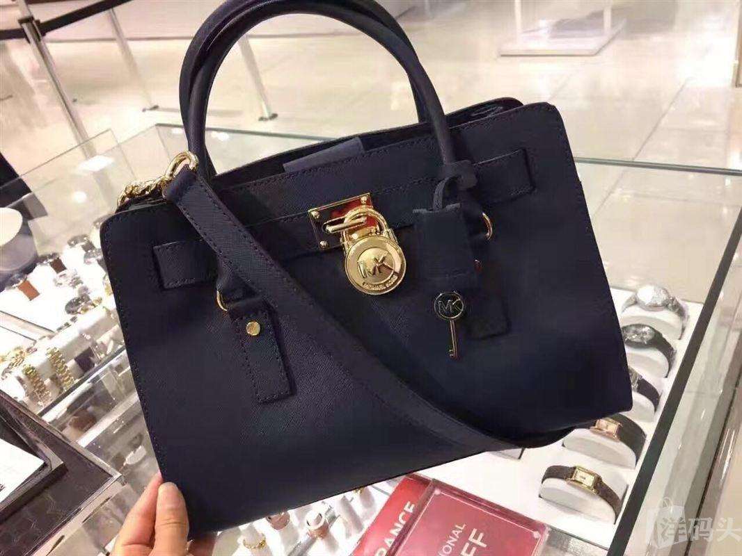 mk还是coach更值得买琴谱包,mk和coach哪个适合45岁