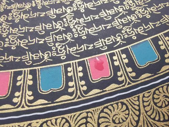 帮朋友检测了幅唐卡，发现是赝品