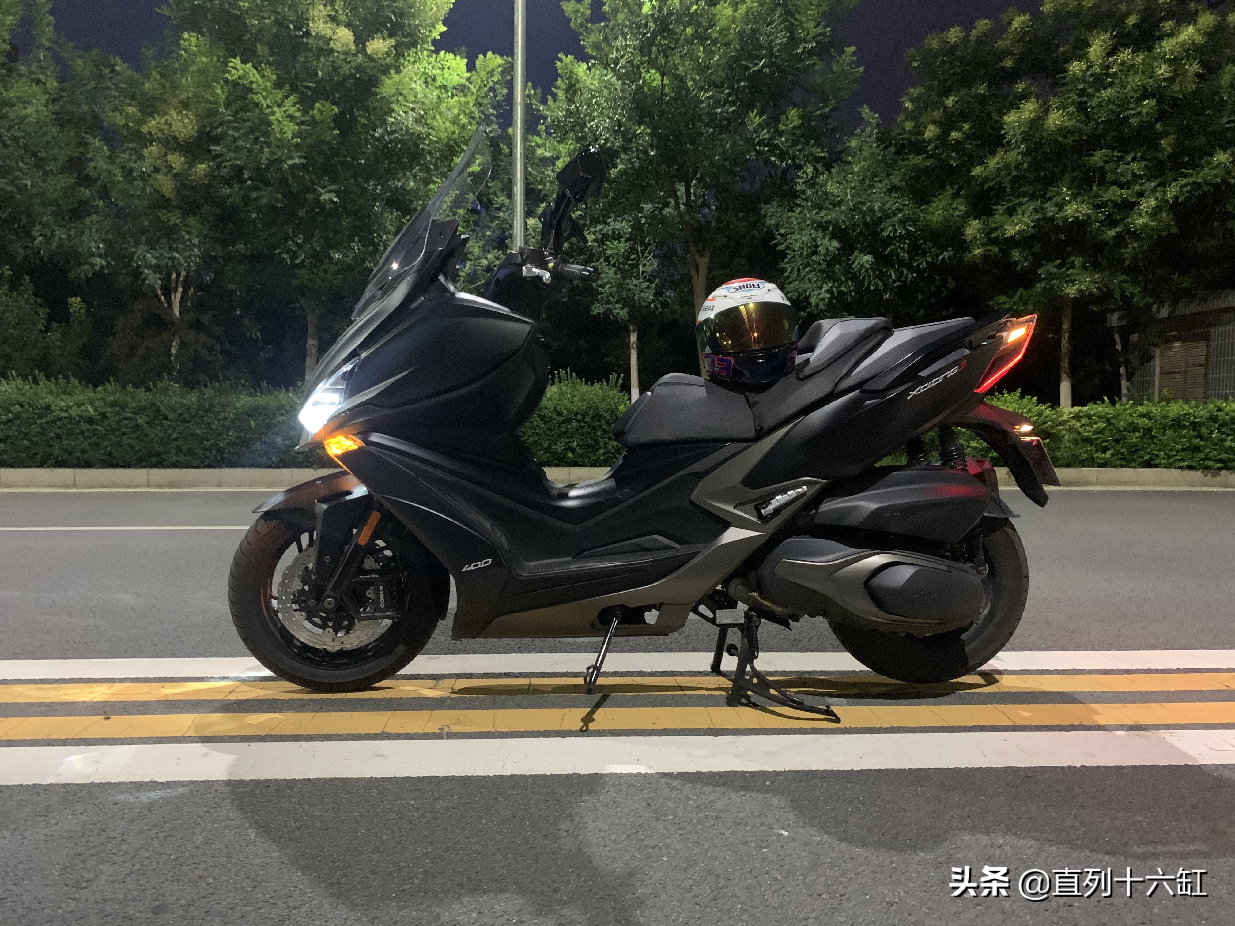 光阳进口赛艇s400国外测试,光阳xcitings400长途表现