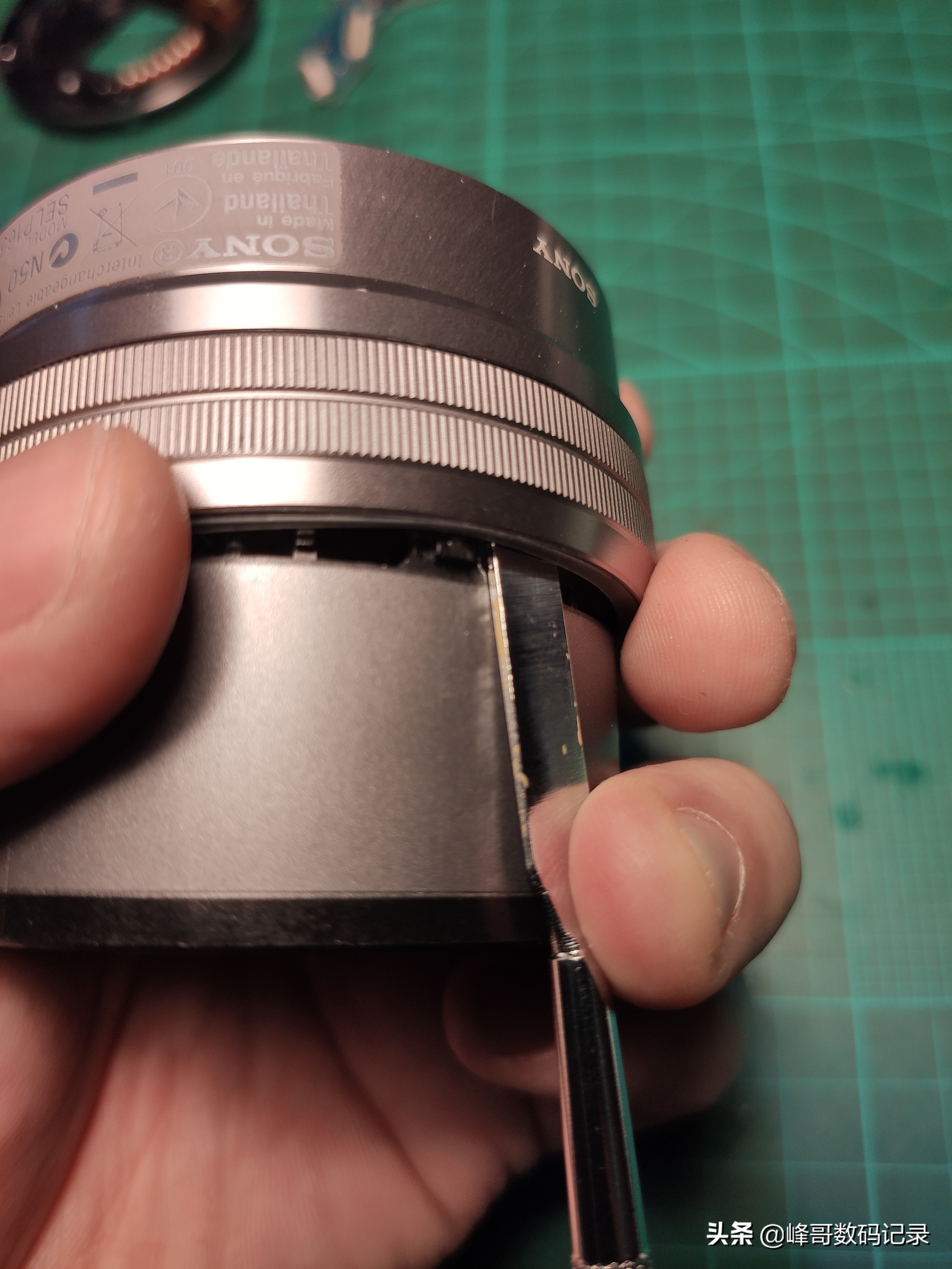 索尼16-50镜头前镜片拆卸,sony16-50镜头拆解图片