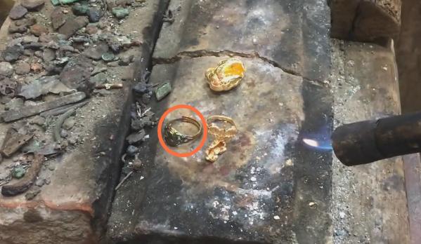 黄金火烧后变黑是什么原因,用火烧黄金变黑是假黄金吗
