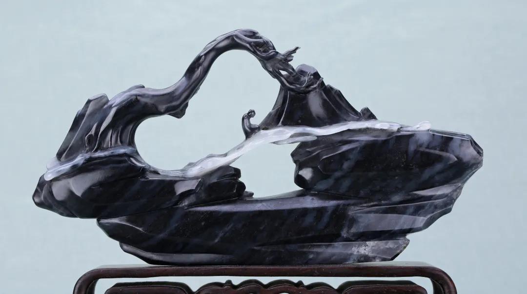 一块墨玉原石多少钱,这块翡翠原石值多少