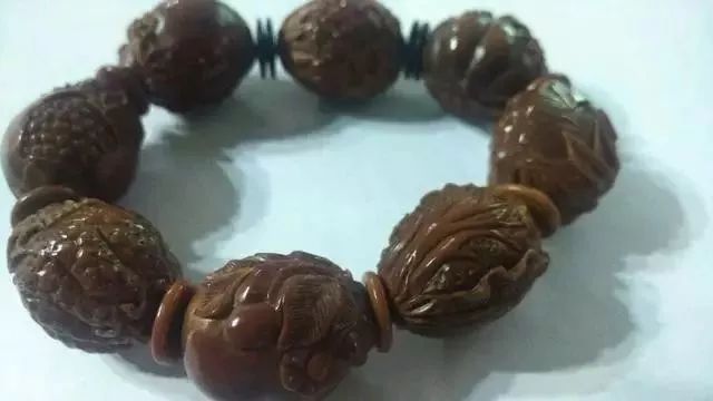 素橄榄核怎么盘包浆快,橄榄核怎么盘包浆快