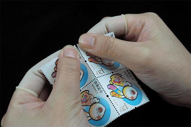 分邮票问题,如何撕邮票教学视频