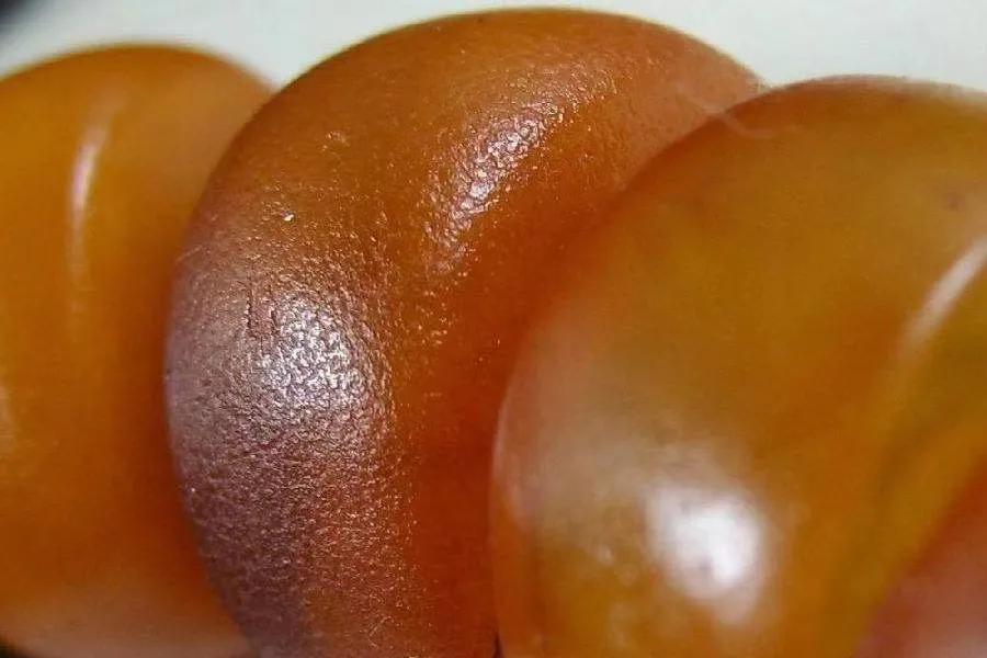 辨别真假蜜蜡的小视频,蜜蜡蓝精灵怎么分真假