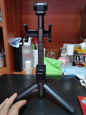 华为三脚架自拍杆af15怎么用,华为有线自拍杆的使用方法及操作