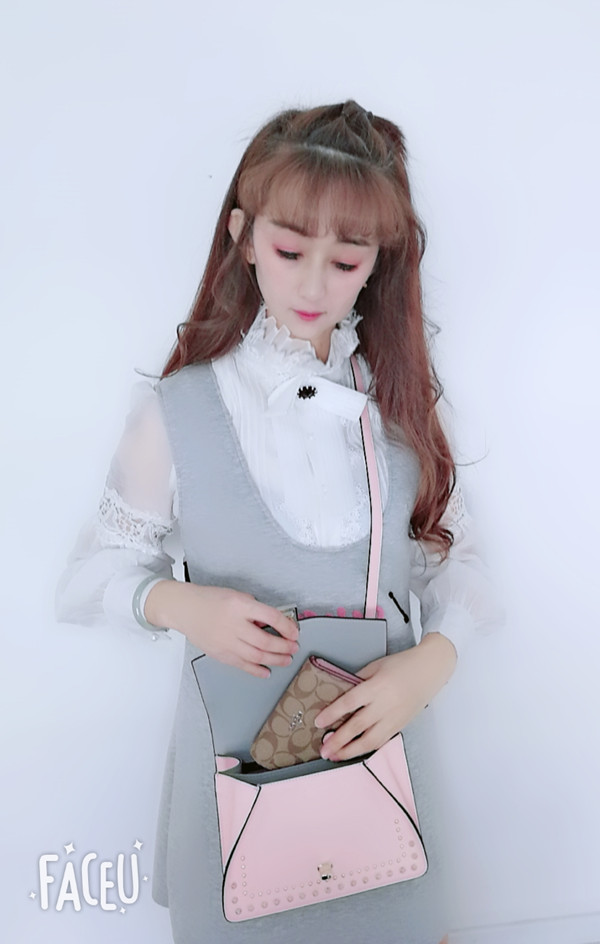 elle双肩铆钉女包,elle铆钉包