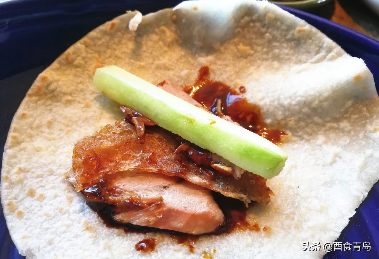 普京大帝在青岛吃的烤鸭,也是我的最爱,除了贵没毛病