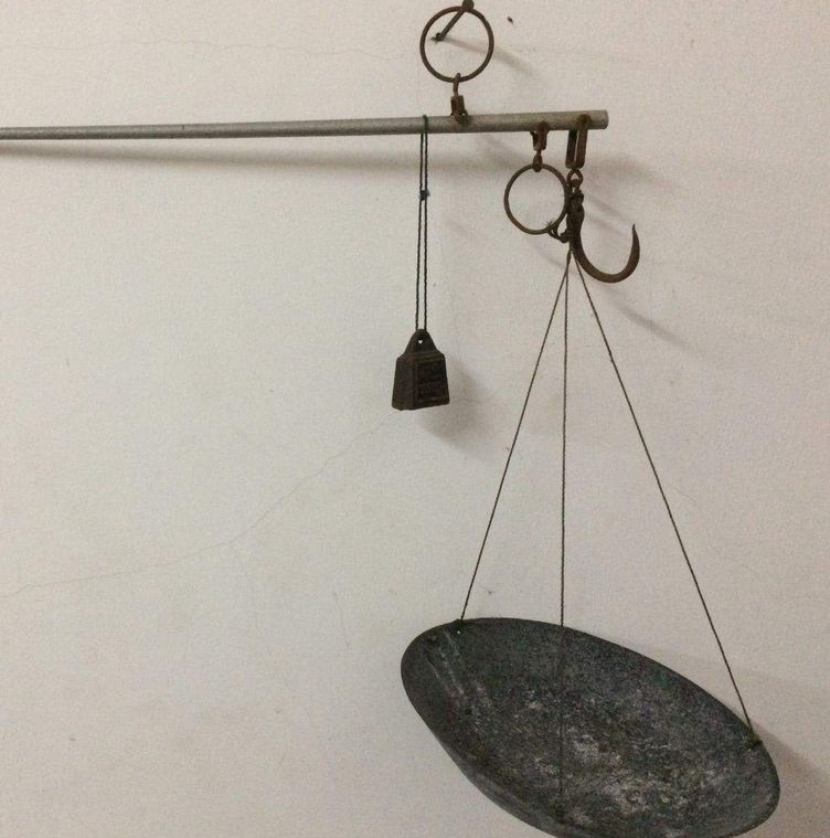 用一杆老秤发家致富，博白这位农民做到了