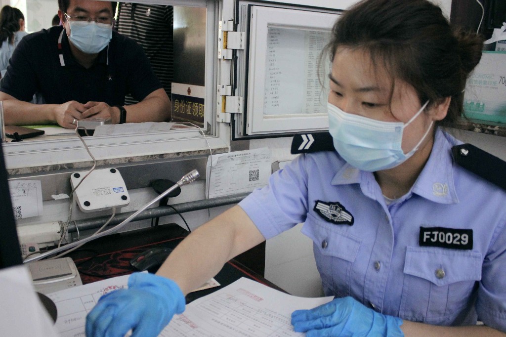 探访西安市业务量最大的户籍室*证办**照片“多拍优选”