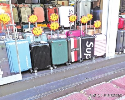 买2个新拉杆箱、出趟门就报废了，“一次性”劣质拉杆箱问题多