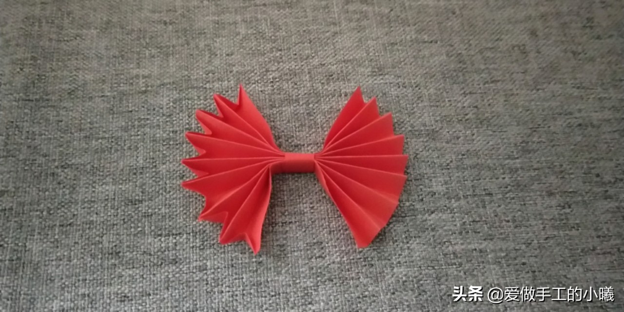 儿童折纸简单手工幼儿园蝴蝶结,蝴蝶结手工折纸超简单正方形纸