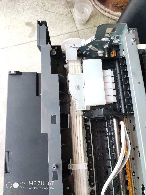 爱普生l1300进纸一点就显示卡纸,爱普生l1300打印歪斜卡纸