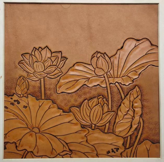 皮雕墙面做法,皮雕上墙设计方法