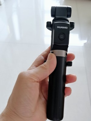 华为有线自拍杆的使用方法及操作,华为手机用自拍杆的使用方法图解