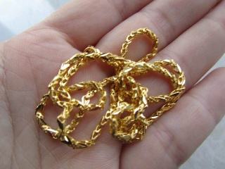 黄金戴久了怎么没那么黄,黄金链子戴了一段时间发黑的原因