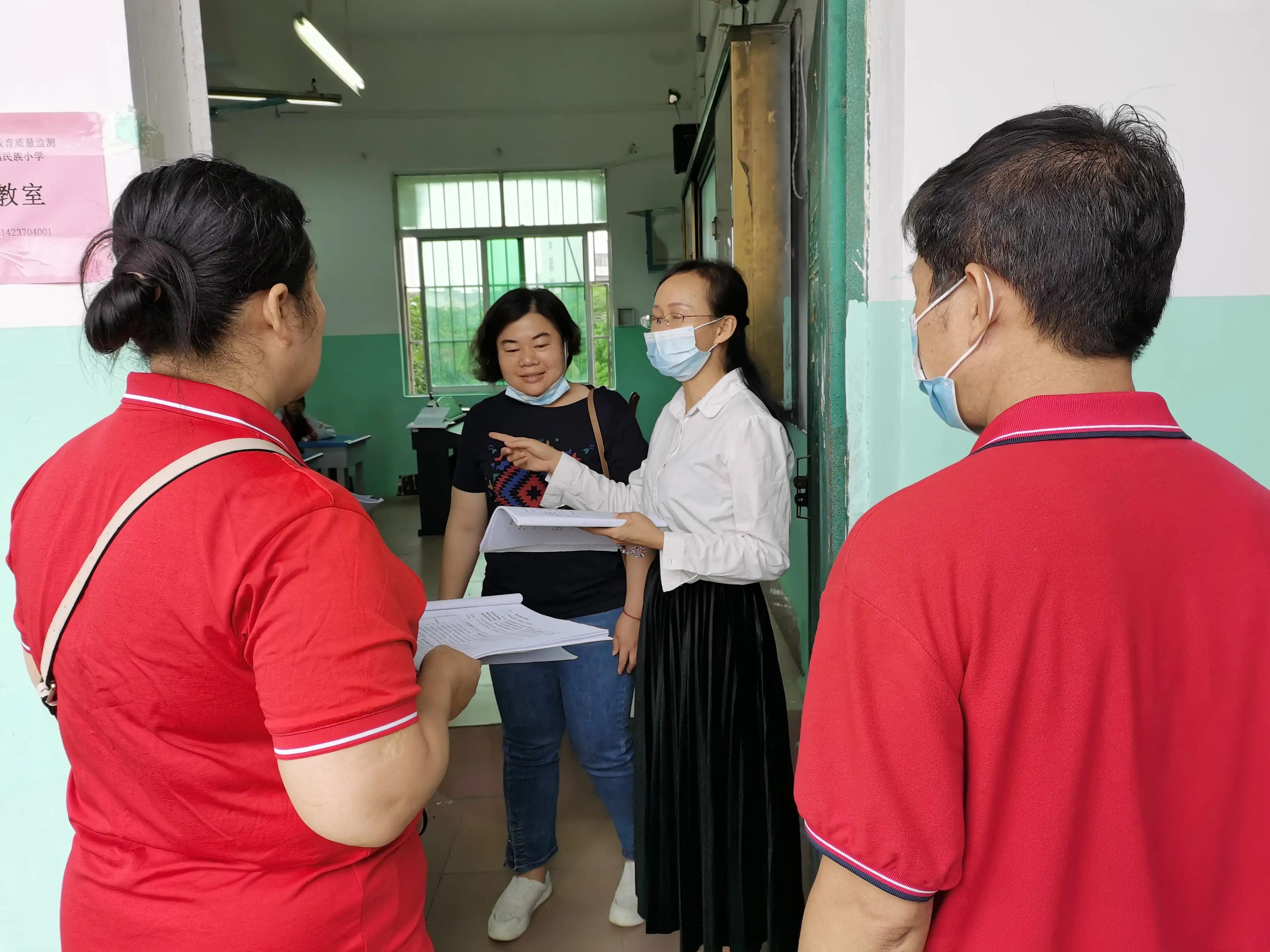 凤凰花开树树红，民小迎检步步实--记民族小学“国测”准备工作