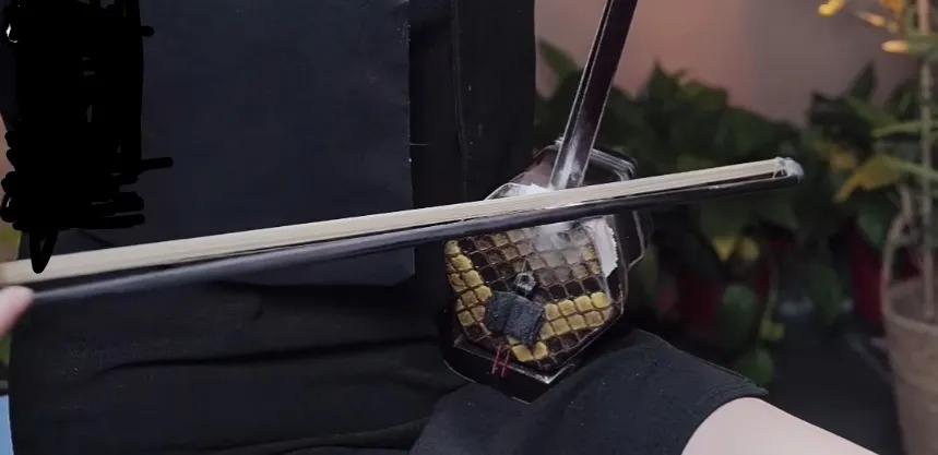 二胡的“花音”和“苦音”表现诀窍，都体现在弓指法的变化上