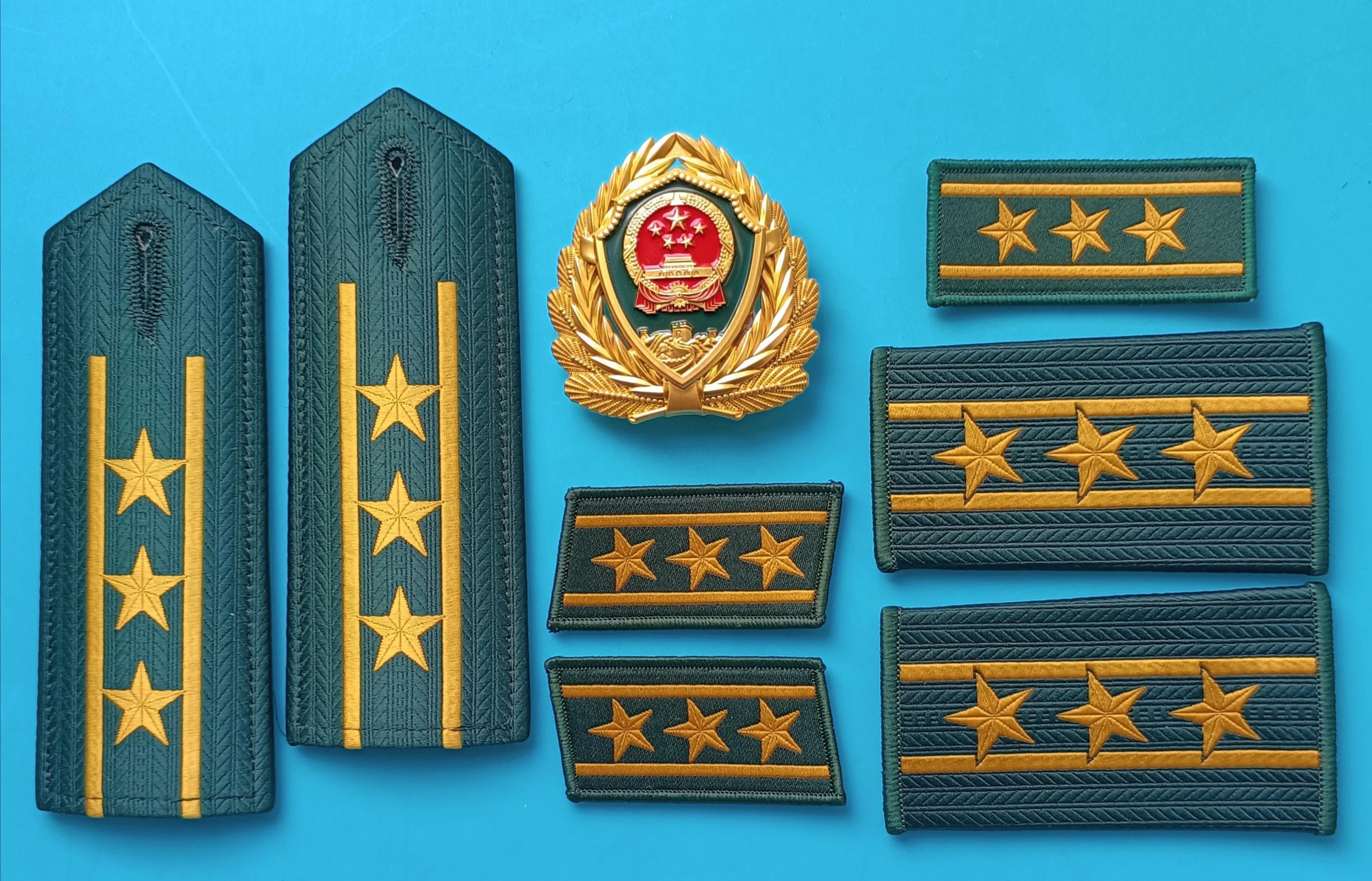 毛启国军装,毛启国警用帽徽