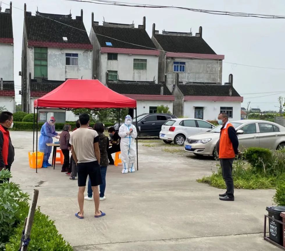 金山的他既是水稻种植户,又是一线抗“疫”志愿者