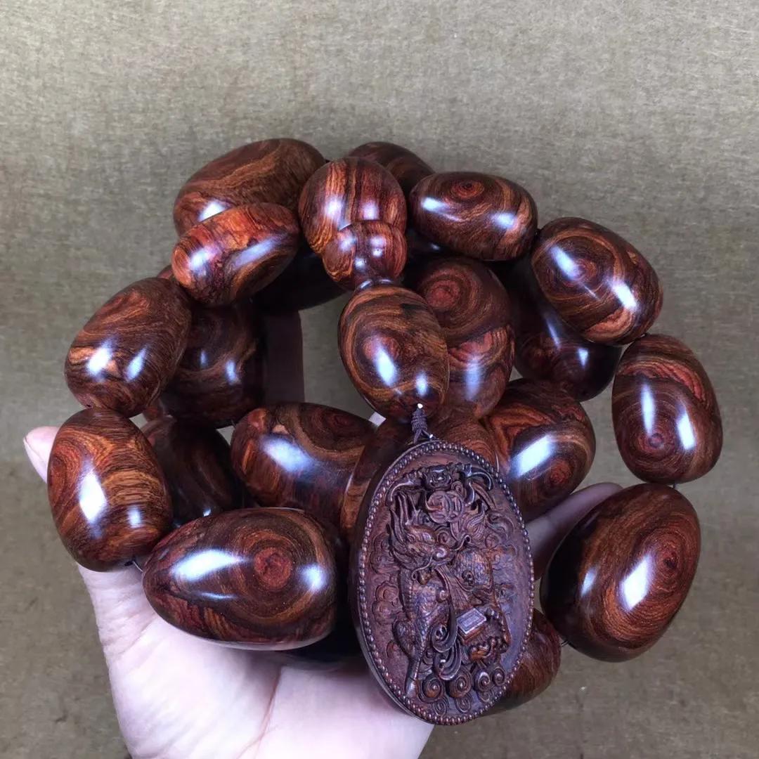 几百块一串的海南黄花梨手串,1.0的108串海南黄花梨手串配饰图片