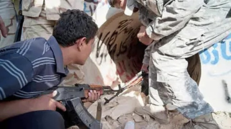 卡扎菲遗体处理,卡扎菲死后被葬在什么地方