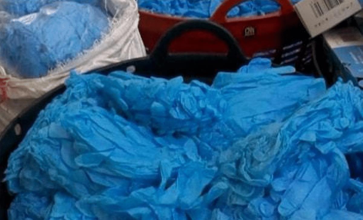 一次性医用手套有血迹,翻新医用手套流入美国