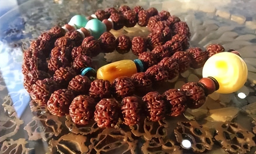 金刚菩提双龙纹和盘龙纹哪个更好,金刚菩提和小叶紫檀哪个值得盘