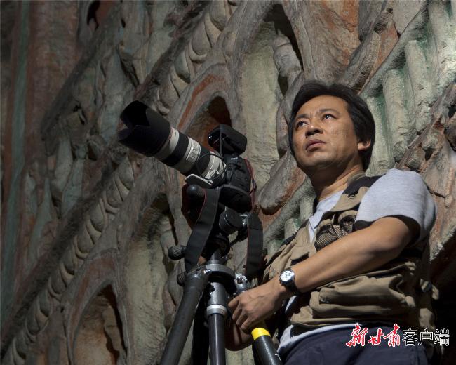 吴健：光影为笔绘敦煌